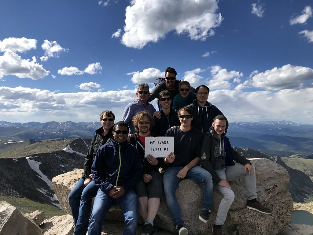 photo showing the AOT-TP research team on top of Mount Evans with an altitute of 14265 feet