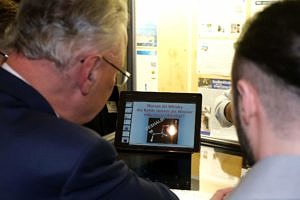 Photograph of Joachim Herrmann trying to answer the question why whisky lubricates the throat better than water or pure alcohol on the basis of DLS measurements