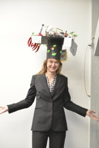 The photograph shows Frances Lenahan wearing her doctoral hat.