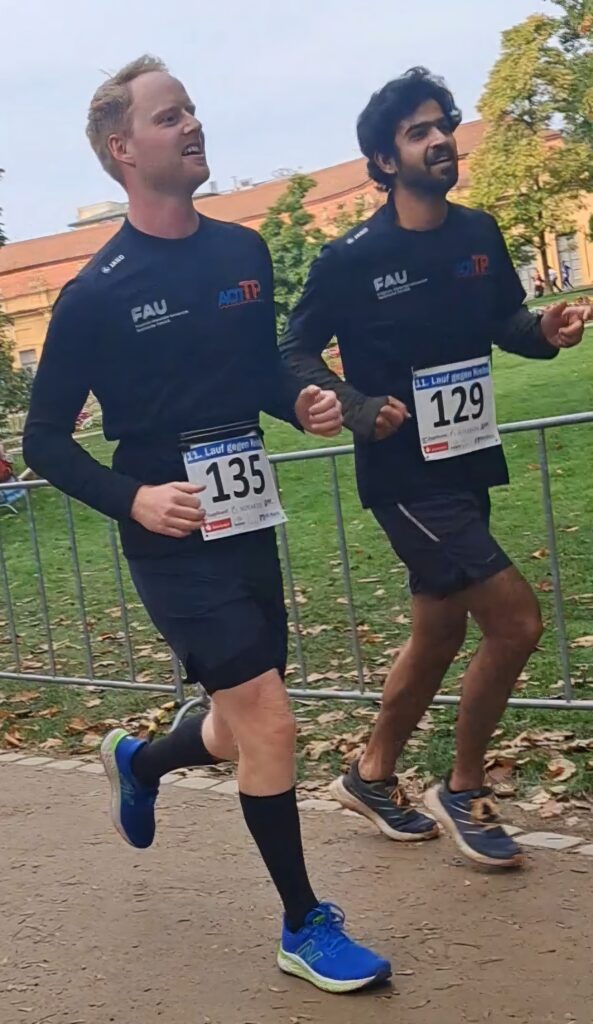 photo showing Julius Kühl and Saad Idrees during the Run Against Cancer 2024