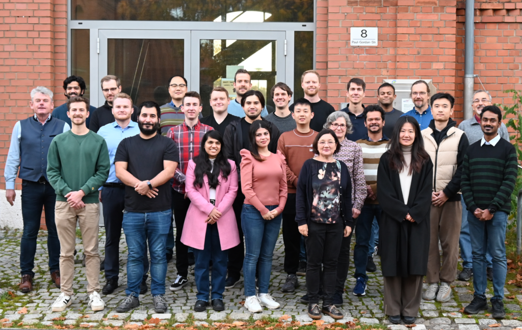 photograph showing all members of AOT-TP in front of the institute entrance in October 2024
