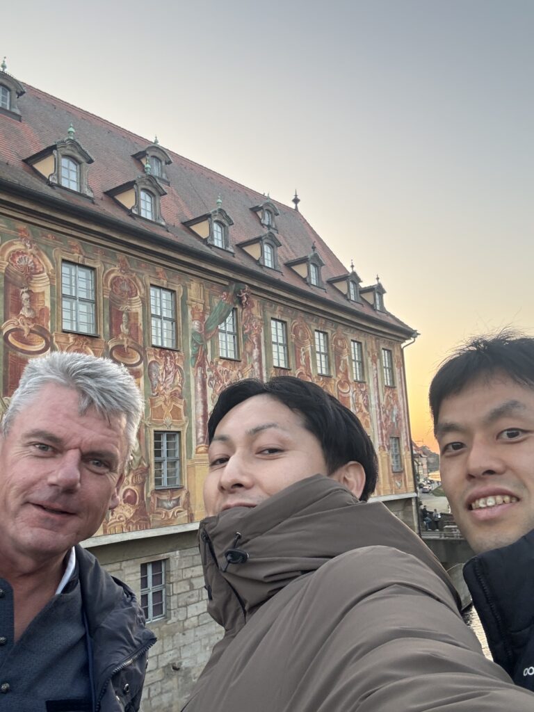 The photo shows Andreas Paul Fröba, Eita Shoji and Akira Yoko